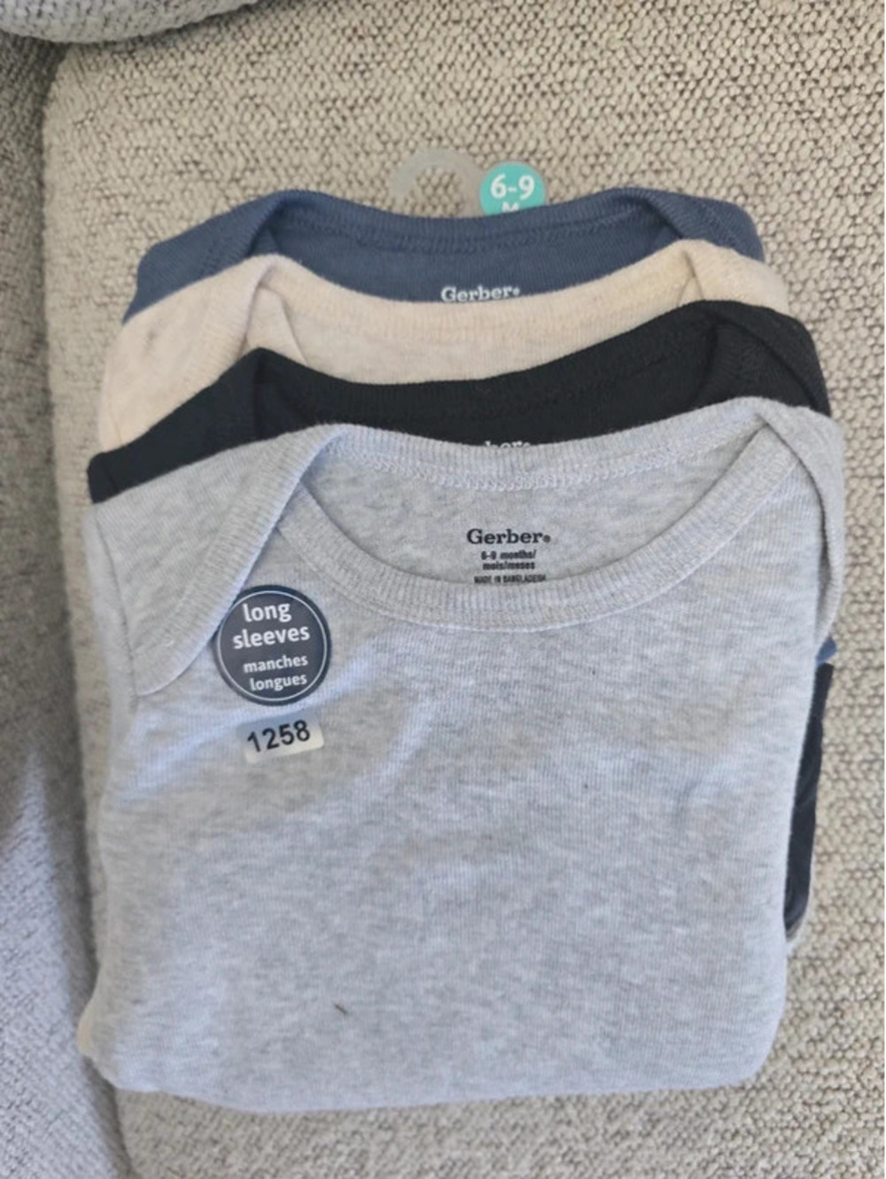 6 to 9m brand new gerber body suits item 1258 bin 24